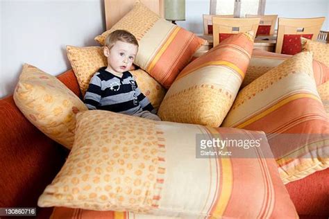 Hiding Behind Cushion Photos And Premium High Res Pictures Getty Images