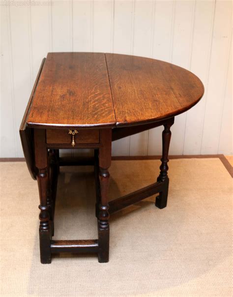 Thanks to the extension mechanism the symmetry with the substructure is always maintained in the extended as well as the closed position. Oak Drop Leaf Dining Table - Antiques Atlas
