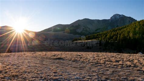 Sunrise Sunburst Over The Land Mountain Of The Idaho Wilderness Stock