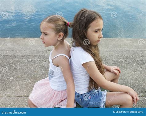Beautiful Little Sisters Are Angry At Each Other Stock Image Image Of
