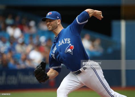 Ja Happ Of The Toronto Blue Jays Delivers A Pitch In The First