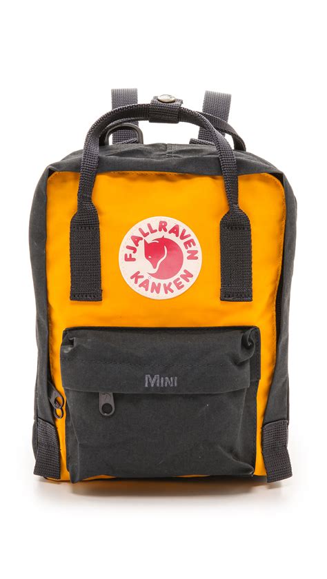 Lyst Fjallraven Kanken Mini Backpack Navywarm Yellow In Yellow