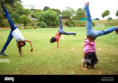 Young Girl Doing Cartwheel In Hi Res Stock Photography And Images Alamy