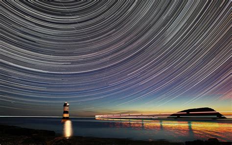 Stars Timelapse Night Lighthouse Hd Wallpaper Nature And Landscape