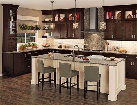 Merillat® nightfall can be paired with. cherry pecan cabinets with white chiffon island - Google ...