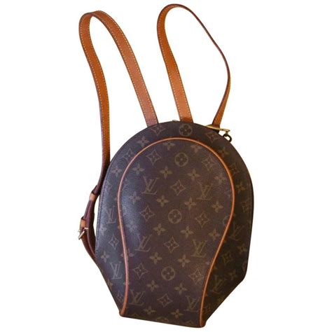 It is rather old bit genuine louis vuitton needs a new zip also has small amount ink on bag , so needs clean it's has serial number lovely bag and real. Small Louis Vuitton Backpack Monogramm Bag For Sale at 1stdibs