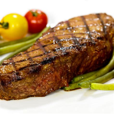 A beefsteak, often called just steak, is a flat cut of beef with parallel faces, usually cut perpendicular to the muscle fibers. Grilled Butter-Marinated Sirloin Steaks