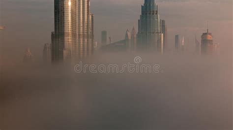 Aerial View Of Dubai City Early Morning During Fog Timelapse Stock