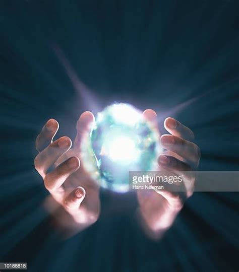 Black Hand Holding Ball Photos And Premium High Res Pictures Getty Images