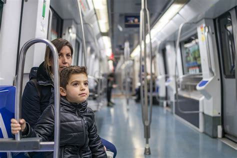 Mother And Son Travelling On The Subway Made In A Pinch