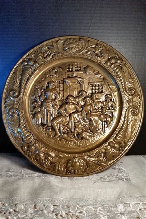 This vintage style wall decor set will add a rustic touch to your furnishing setup. Renaissance Round Brass Plaque Plate Wall Hanging Vintage ...