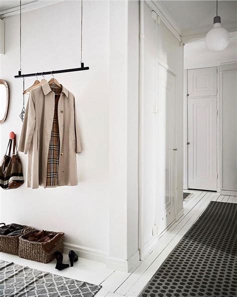 Chic Vertical Storage For The Win Lacking Wall Space Hang A Rod A La