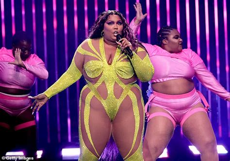Lizzo Stuns In A Neon Yellow Nude Illusion Bodysuit On Stage During Her Special Tour In Nyc