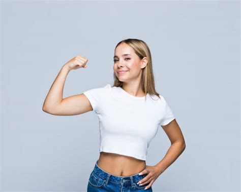 Girls Flexing Biceps Stock Photos Pictures And Royalty Free Images Istock