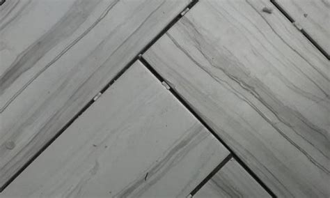 If you want to highlight a color or accent in your tile, like the gray veins in a marble tile, go for a close match, or a bit darker than that shade in your tile. Help! Dark or Light Grey Grout for Floor Tiles?