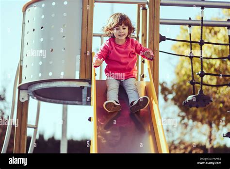 Portrait Little Girl Sitting Slide Playground High Resolution Stock