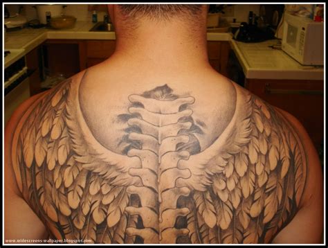 18 beautiful tribal wings tattoos sumber : New lovely men's back tattoo