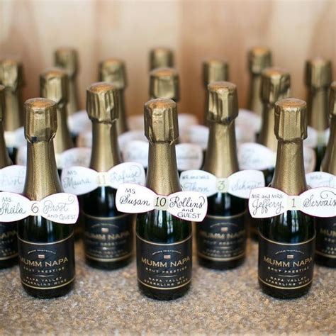 These Adorable Mini Champagne Bottles Double As Table Numbers And