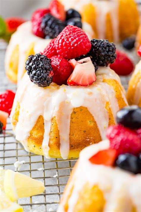 I realized that lemon blueberry mini bundt cakes were in order (based on my crisp recipe), and that they would be perfect to make for easter brunch or for a spring picnic. Mini Lemon Poppy Seed Bundt Cakes - Oh Sweet Basil