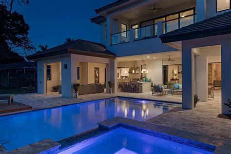 Infinity Pool And Spa Rear Elevation At Dusk Home Custom Designed By