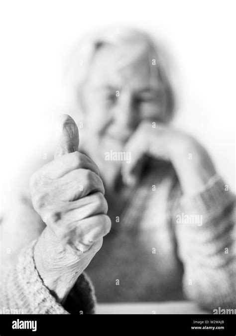 Mature Woman Content Looking At Camera Black And White Stock Photos Images Alamy