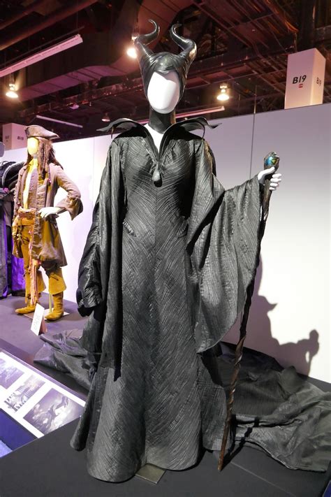 Maleficent revealed—explore the layers of extraordinary. Hollywood Movie Costumes and Props: Angelina Jolie's 2014 ...