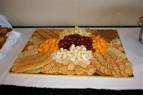 Cheese And Cracker Display For A Holiday Party Christmas Party Food