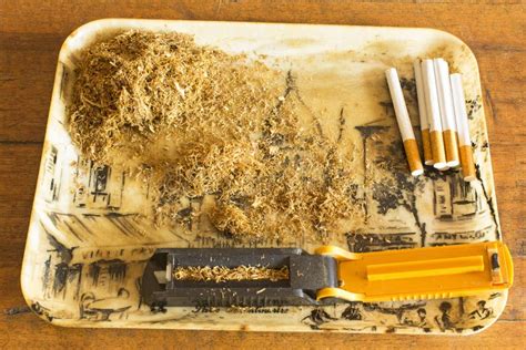 Manually Making Cigarettes With The Tobacco Machine Stock Photo Image