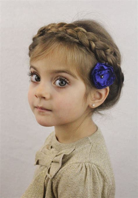 Cuddly and cute kid, with two small ponytails secured in a side parted manner with a beautiful clip tucked on front to enhance her charm. Cute Christmas Party Hairstyles for Kids | Hairstyles 2017 ...