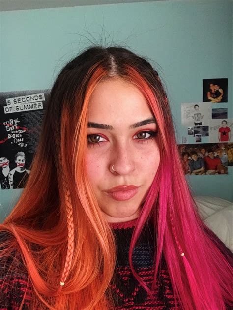 Pink And Orange Split Hair Split Dyed Hair Hair Color Orange Pink Hair Dye