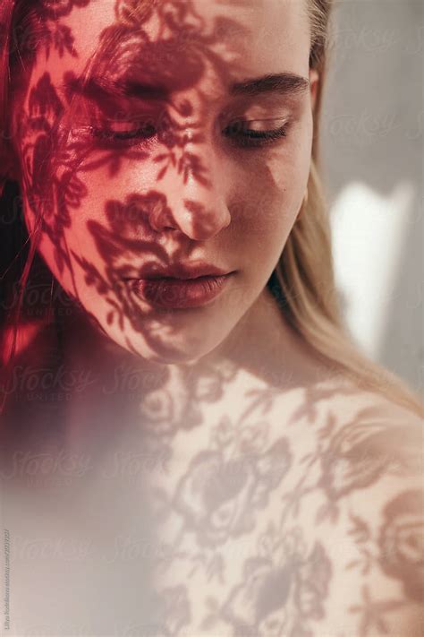 Closeup Portrait Of Amazing Girl With Floral Shadows On Her Face Del