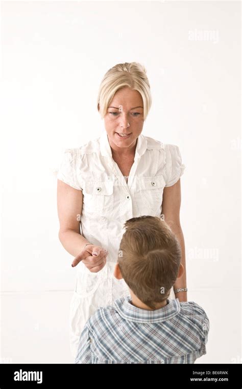 Mother Scolding Her Son Stock Photo Alamy