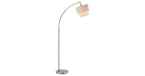 We once had a sofa angled in the corner. The classic arc floor lamp is perfect for behind a sofa or in a corner. This one is especially ...