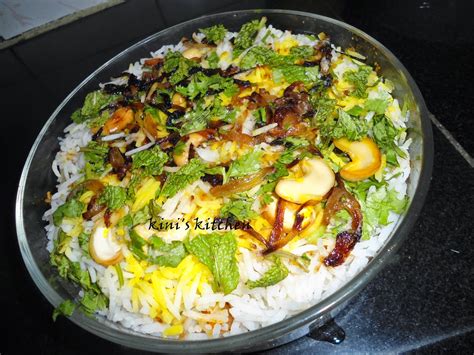 Layer partially cooked basmati rice over it. Hyderabadi Biryani