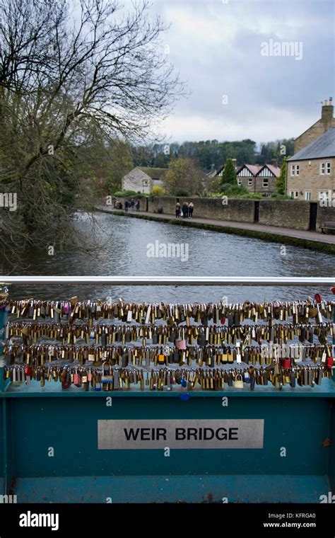 Love Locks Attached To Weir Bridge Over The River Wye Bakewell