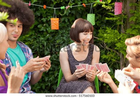 Group Young Friends Playing Cards Garden Stock Photo 517560103