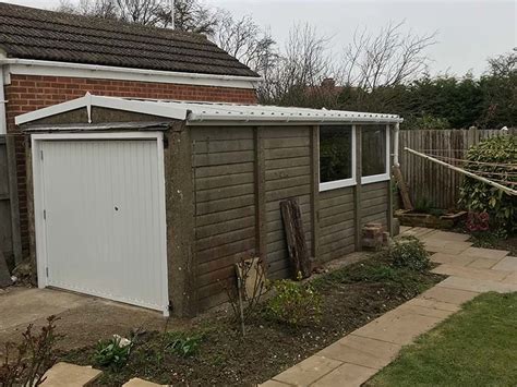 This is a simple replacement job where you are removing the old door and installing the new one. Concrete Sectional Garage Refurbishment | Danmarque Garages