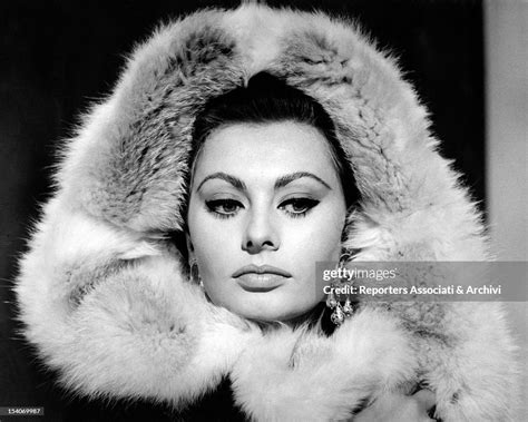 The Italian Actress Sophia Loren Posing With A Fur Hood She Is In