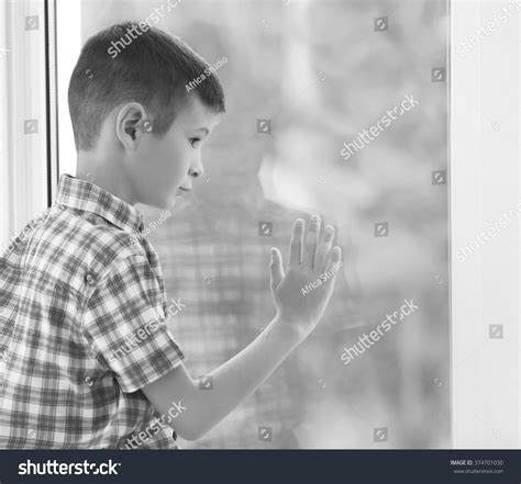 Sad Boy Sitting Near Window Stock Photo 374701030 Shutterstock