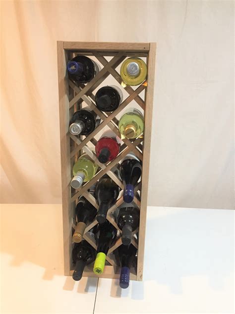 If you want to buy a wine cabinet, you have to search for a cabinet, and expect to pay more than $48. Diamond lattice wine rack | Wine rack, Wine rack cabinet, Rustic wine racks