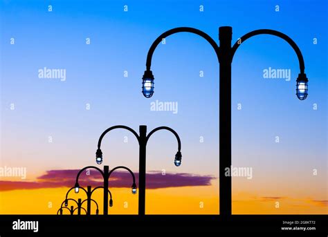 Ornate Street Lamps During Twilight Stock Photo Alamy