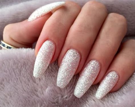 White And Silver Glitter Nails Long Coffin Nails This is ... This is a cute and elegant nail idea.
