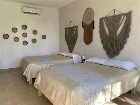 Quadruple Room with Private Bathroom | Casa Delia Hotel