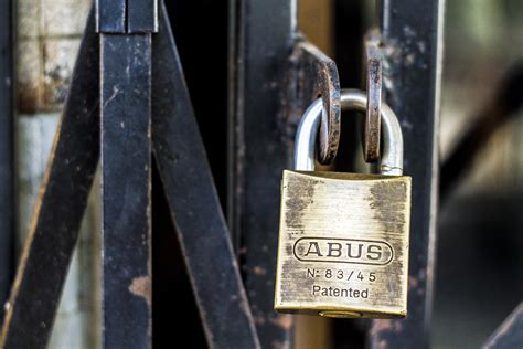 Brass Colored Metal Padlock With Chain · Free Stock Photo