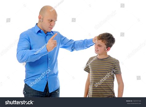 Photo De Stock Strict Father Punishes His Son Isolated