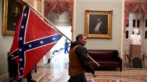 Capitol Rioter Carrying Confederate Flag Wanted By Fbi ‘seeking The