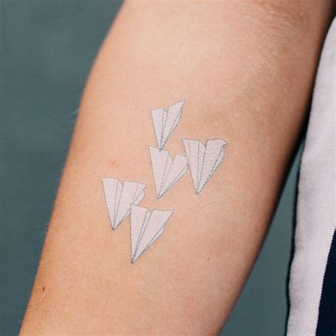 Geometric Tattoo Paper Airplane Tattoos Meaning Pin Paper Airplane