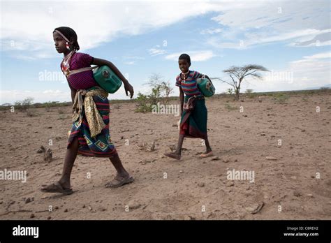 Ethiopian Girl Is Fetching Water Stock Photo Alamy