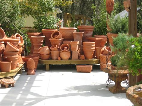 Pottery In A Tumble Display Pottery Display Plant Display Ideas
