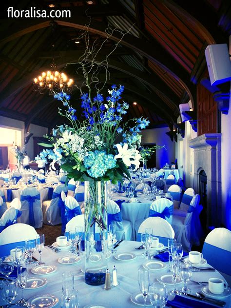 Ready to start bookmarking wedding inspiration? Gorgeous blue wedding table centerpieces by floralisa.com ...